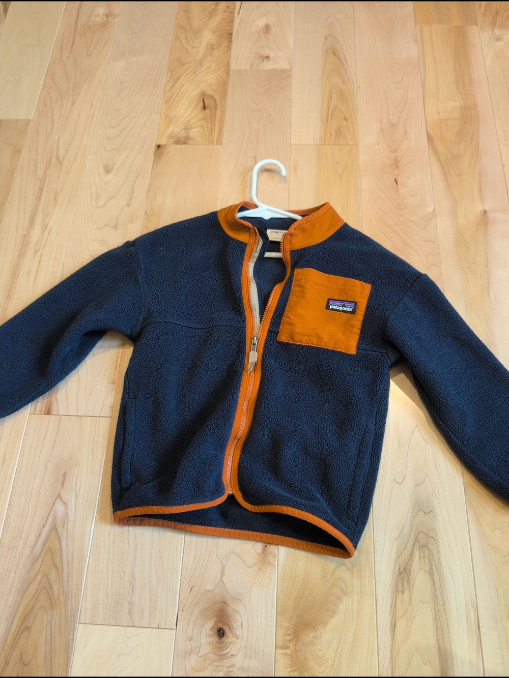Patagonia Navy Fleece Jacket with Orange Trim